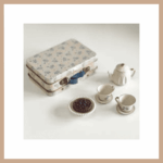 Selection of kids' gifts in Geneva toy stores. Porcelain tea set for children, kids' Christmas gift Geneva for imaginative and decorative play